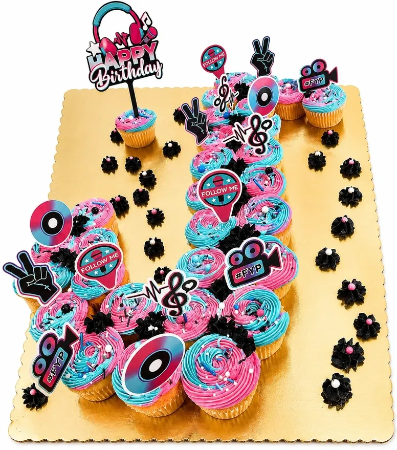 Number 18 pull-apart cupcake cake with pink and turquoise frosting and music-themed birthday toppers