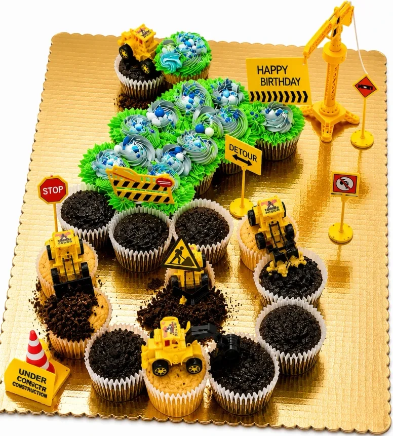 Number 4 construction-themed pull-apart cupcake cake with trucks, signs and green and blue frosting